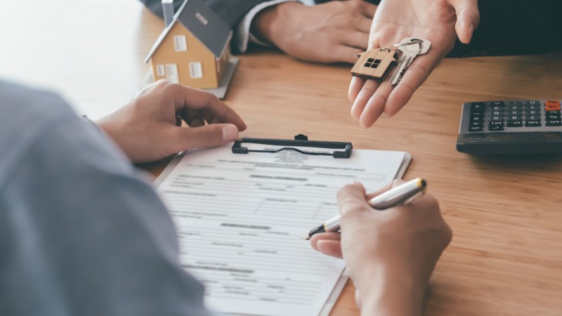 Customer signing contract for a new house. Customer signing contract for a new house. Real estate buy or rent or sale house and insurance or loan real estate.